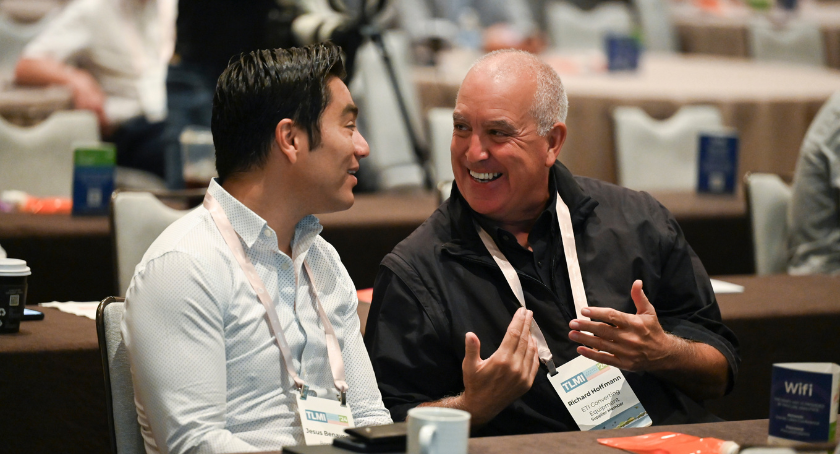 Jesus Benavente (L) and Richard Hoffmann catch up during a recent TLMI event.